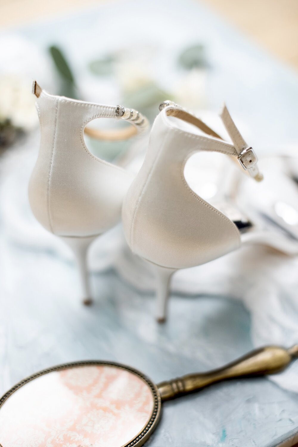 Bridal shoes by Essi Photography