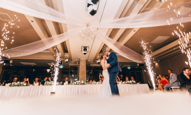 Photo of bride and groom's first wedding dance by TranStudios Photography & Video from Pexels