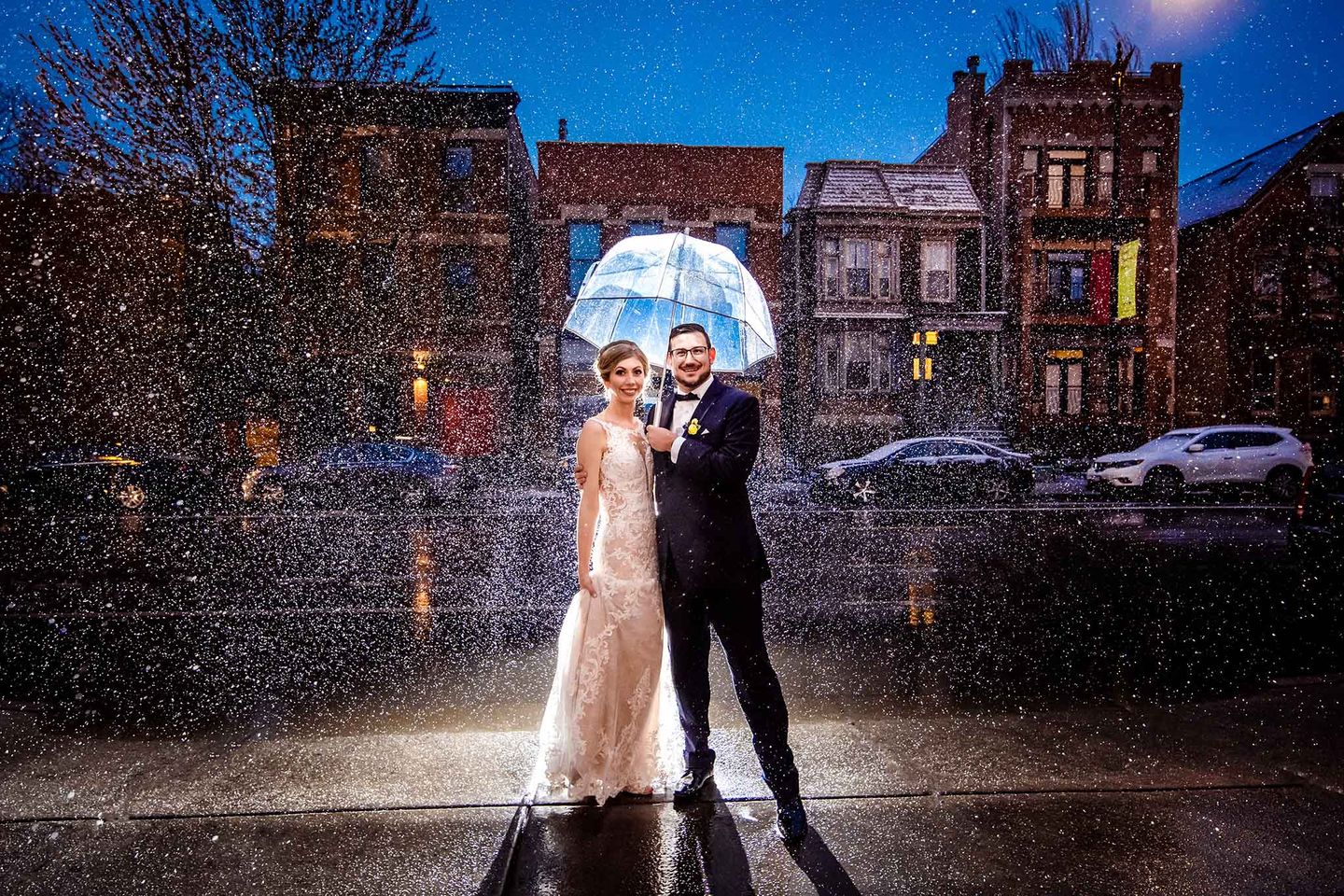 Wedding couple in the rain - photo by WS Photography